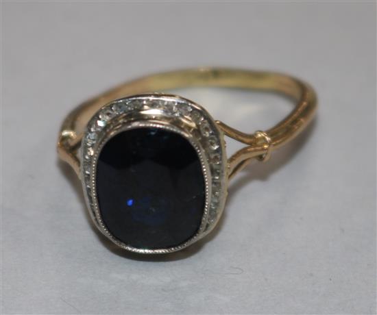 An 18ct gold sapphire and rose cut diamond set dress ring, shank misshapen.